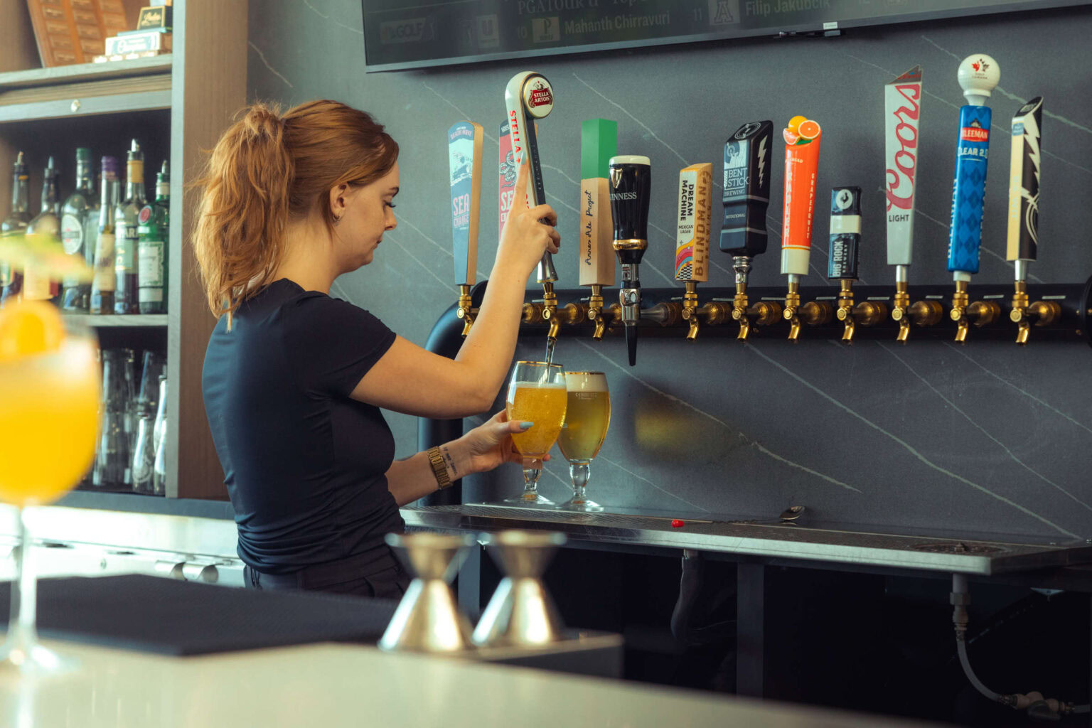 Cold beer on tap at Highlands Golf Club bar.